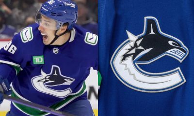 Andrei Kuzmenko signs extension with Canucks