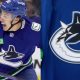 Andrei Kuzmenko signs extension with Canucks